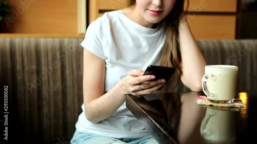 attractive young girl in a cafe