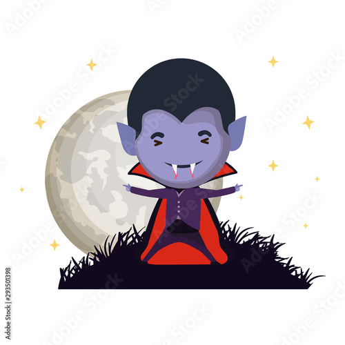 cute little boy with dracula costume in dark night scene