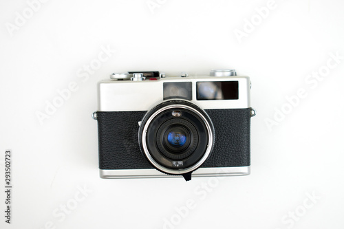 The top view of a film camera on a white background. Isolated background.