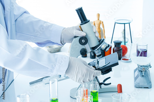 Medical or scientific laboratory researcher performs tests