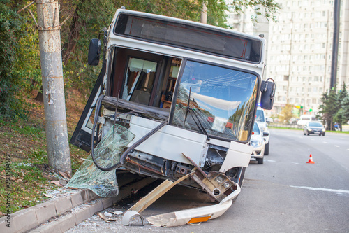 Road accident, accident with a passenger city bus, the bus crashed into a pole photo