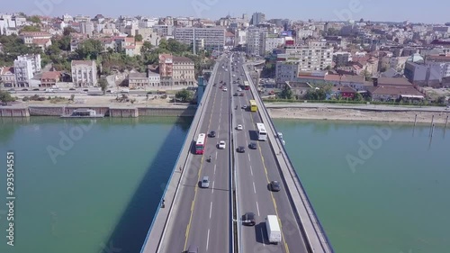 Slow 4k aerial flyover shot over Branko bridge on Sava river, Belgrade photo