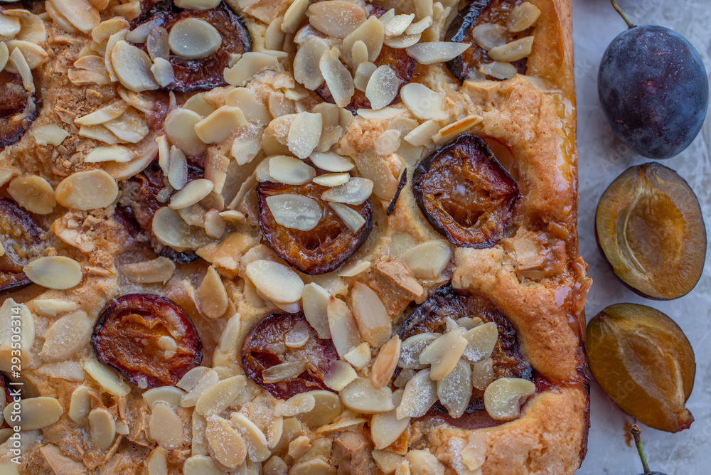 Fototapeta premium home made sweet rustic plum cake on a table