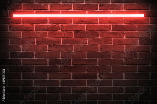 Background texture of empty red brick wall with red neon light lamp, 80s style glow
