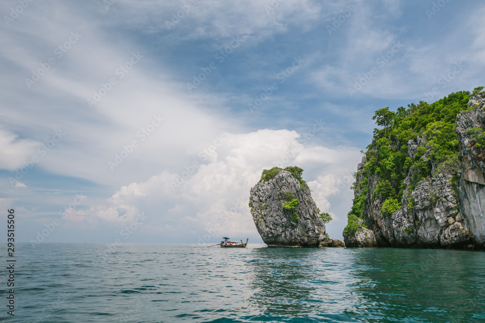 Small limestone island in the ocean, Thailand. Small limestone island in the ocean, Thailand.