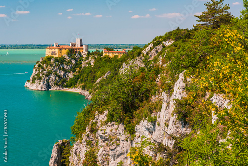 Fototapeta Naklejka Na Ścianę i Meble -  Gulf of Trieste. High cliffs Between boats, karst rocks and ancient castles. Duino. Italy