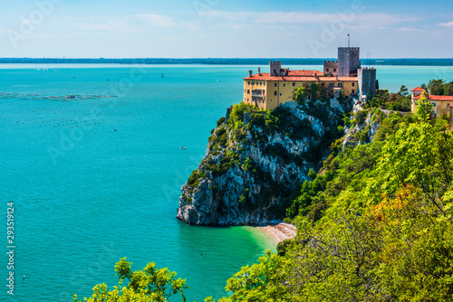 Fototapeta Naklejka Na Ścianę i Meble -  Gulf of Trieste. High cliffs Between boats, karst rocks and ancient castles. Duino. Italy