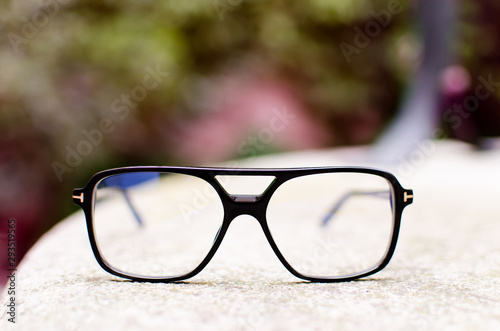 Close up with black plastic fashionable eyeglasses