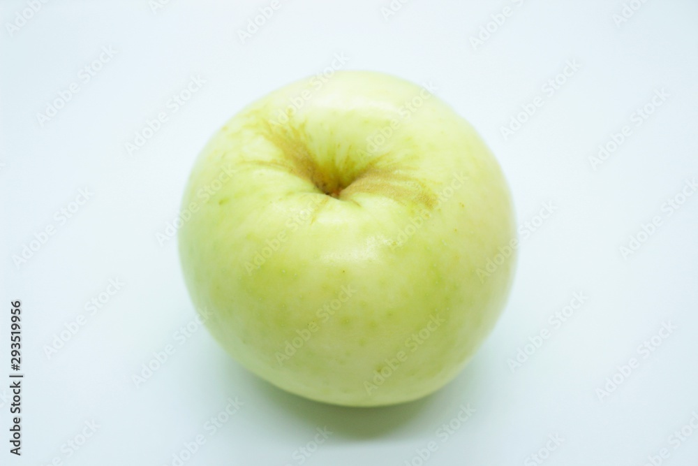 Green apple located on a white background Green apple located on a white background