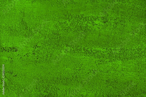 abstract aged green limestone like stucco texture for use as background.