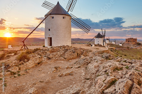 Traditional antique windmills at sunset in Spain. Consuegra, Toledo