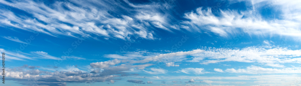 Panorama Clouds are streaks and blue sky.Flushed, fluffy white clouds scatter in full light clear sky. Panorama Clouds are streaks and blue sky.Flushed, fluffy white clouds scatter in full light clear sky.