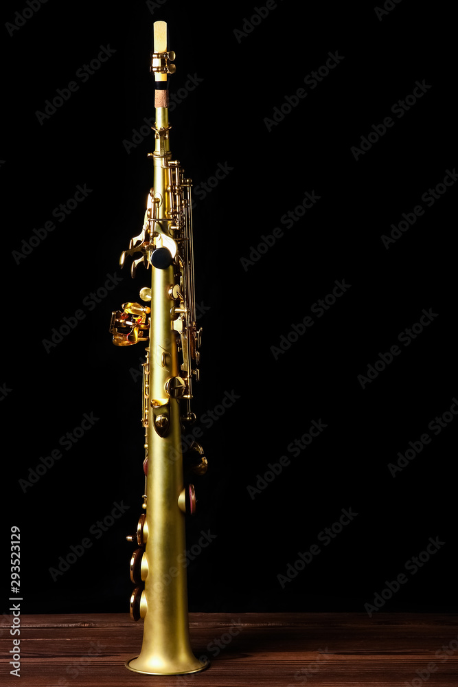 soprano saxophone on black background soprano saxophone on black background