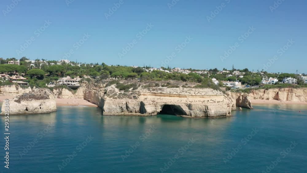 Aerial shot of the cliffs at Albufeira, Algarve region in Portugal Aerial shot of the cliffs at Albufeira, Algarve region in Portugal