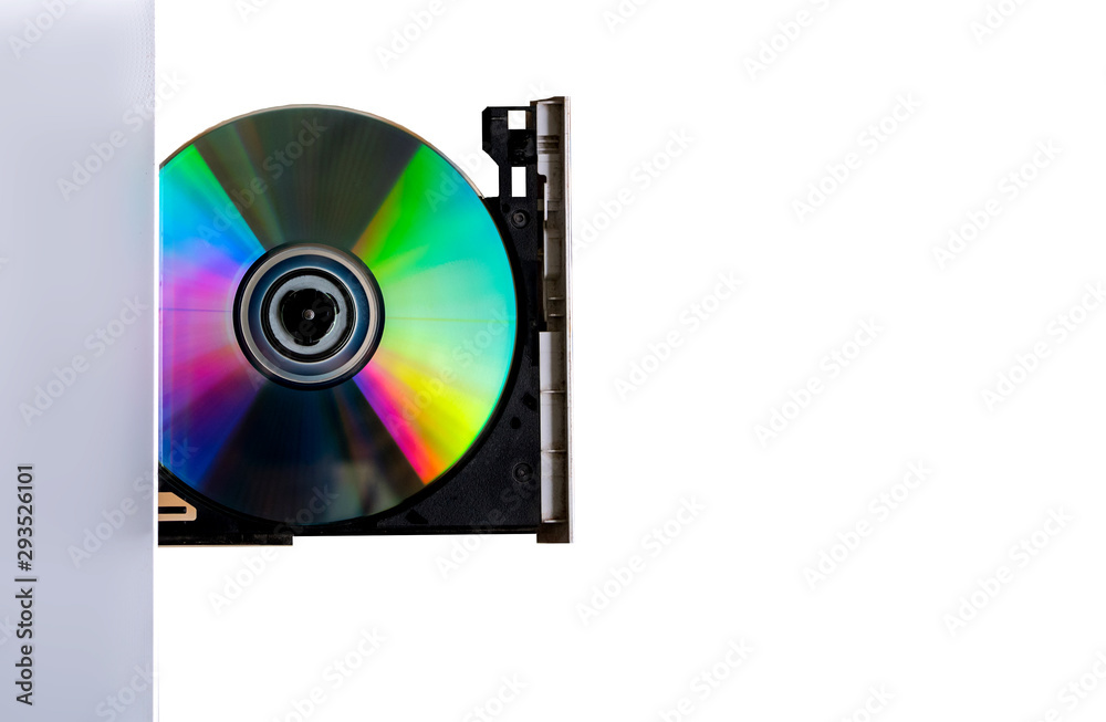 Computer with open tray on blurred background. Computer with open tray on blurred background.