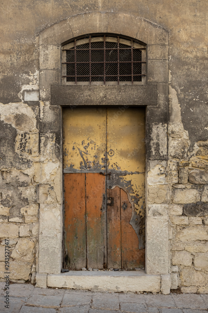 old Italian palace door in ruined wood