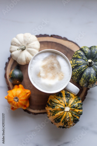 Pumpkin Latte on marble background with copy space, rustic style