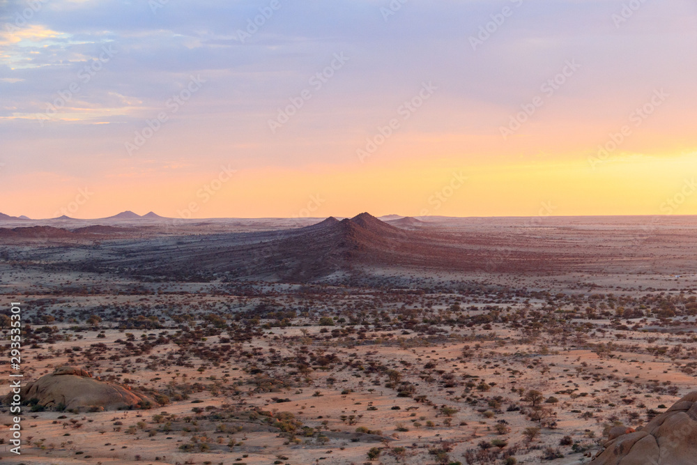 The vastness of Spitzkoppe nature reserve during sunset, Namibia, Africa