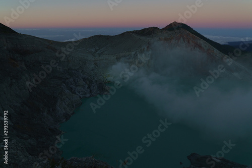 First light with fog. Sunrise on on the mountain  Ijen  Java ,Indonesia. © Anna