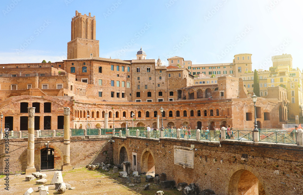 Forum and Market of Trajan in Rome, Italy. Famous old Trajan Forum is one of the main tourist attractions in the city. Ancient Roman architecture and ruins of Trajan's area in summer.