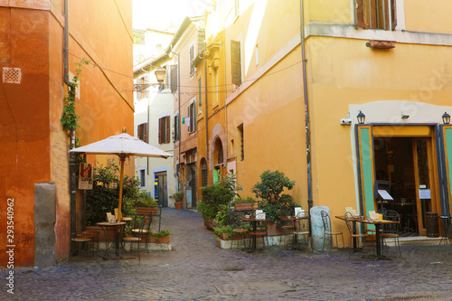 Trastevere in Rome, Italy. Cozy old street in Trastevere neighborhood of Rome, on the west bank of the Tiber, architecture and landmark of the city of Rome.