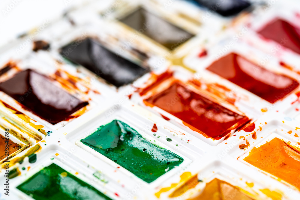 Set watercolor paints with paintbrush. Art concept