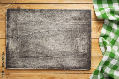 cloth napkin at rustic wooden background  top view