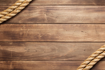 ship rope at wooden background texture