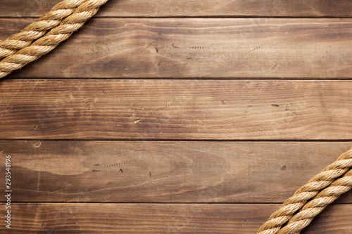 ship rope at wooden background texture