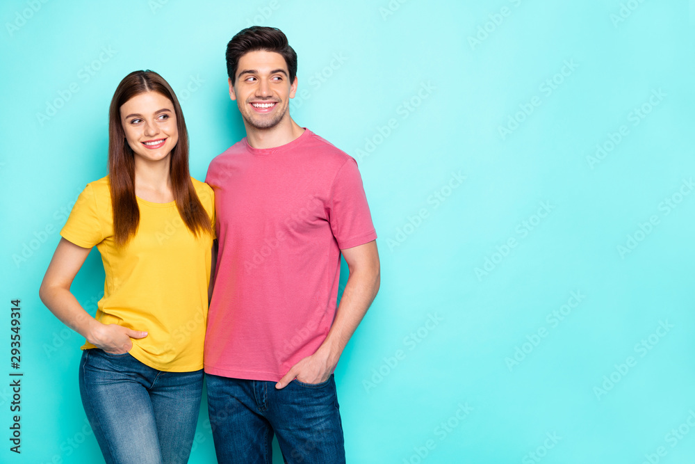 Portrait of his he her she nice attractive lovely charming cute cheerful cheery couple hugging looking aside blank space isolated over bright vivid shine vibrant green turquoise background Portrait of his he her she nice attractive lovely charming cute cheerful cheery couple hugging looking aside blank space isolated over bright vivid shine vibrant green turquoise background