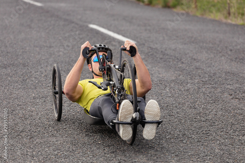 Man cycling on recumbent bicycle