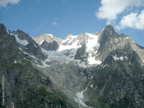 global warming, climate change effect and pollution concept; melting glacier on the mountains