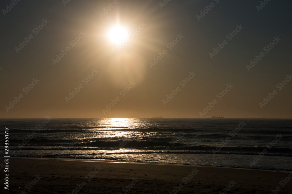 Sunrise over the Ocean and Waves Sunrise over the Ocean and Waves