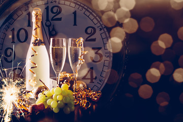 New Year party with champagne and grapes