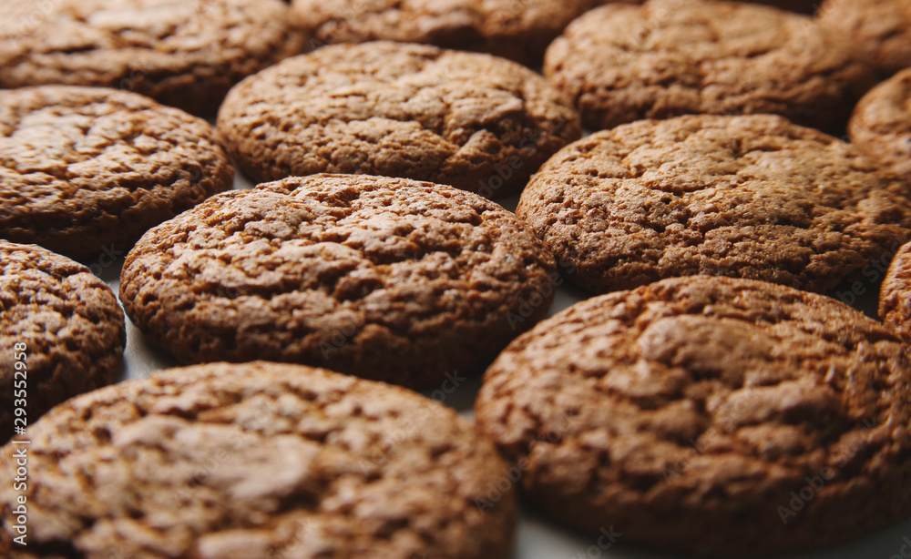 Freshly baked oatmeal cookies low angle view, shallow depth of field, selective focus