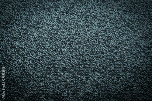 Close-up of black gray plastic material seamless texture. Surface of rough abstract dark black matte background. Design in your work backdrop, concept copy space for text.