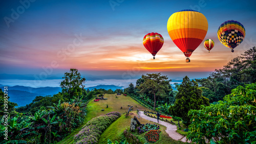 Hot air balloons adventure in nature over winter mountain in Chiang Mai, Thailand.