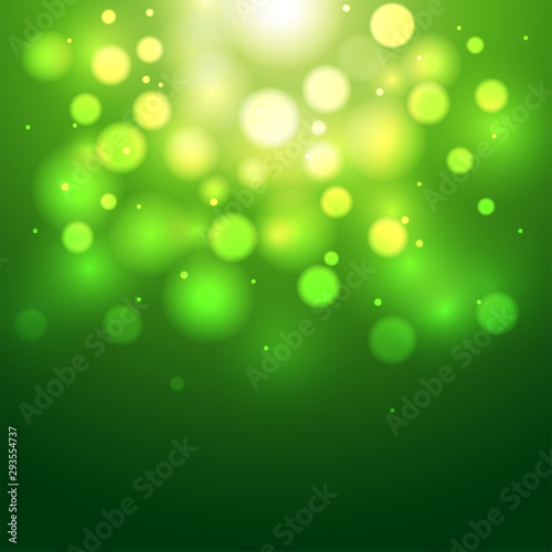 Green defocused bokeh light abstract background.