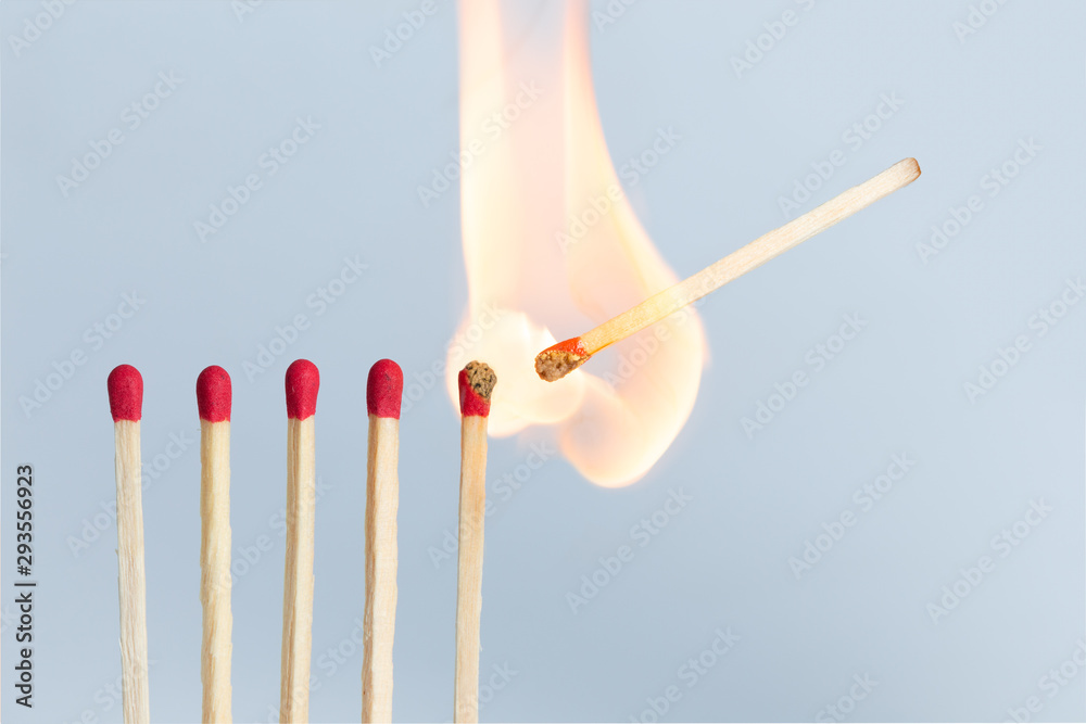 Matches in group burning safety-match with red, orange, yellow fire. Isolated on white background Matches in group burning safety-match with red, orange, yellow fire. Isolated on white background