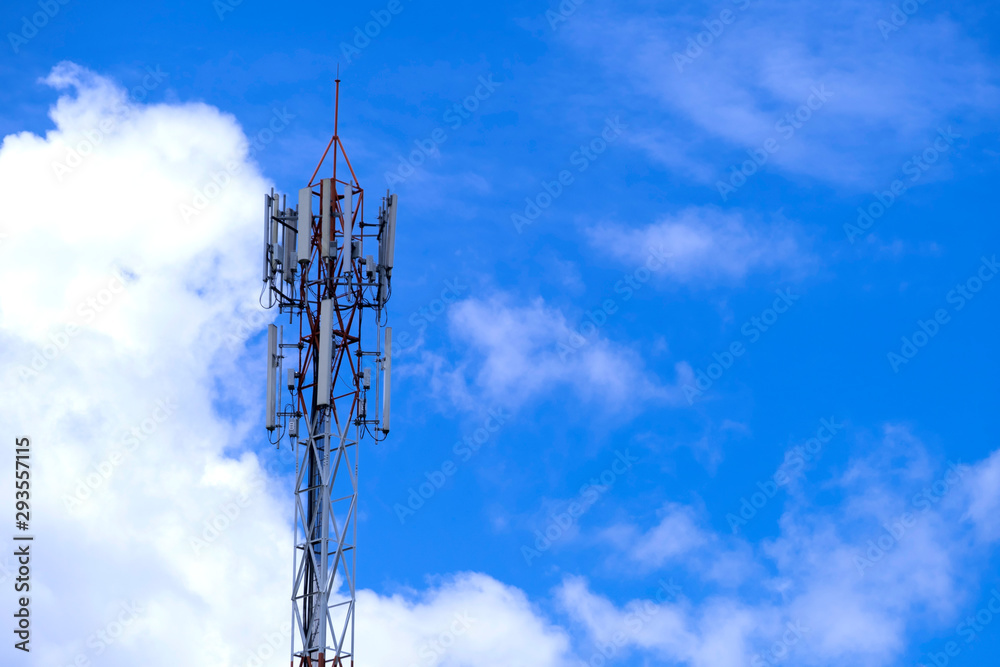 Telecommunication telephone signal transmission tower with beautiful blue sky background