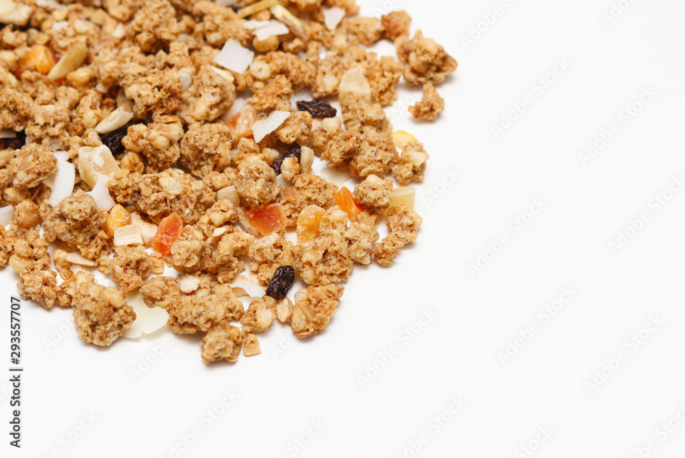 Granola with fruits and nuts. Baked muesli mix. Super food concept. Breakfast cereals. Kids diet. White isolation background. Granola with fruits and nuts. Baked muesli mix. Super food concept. Breakfast cereals. Kids diet. White isolation background.