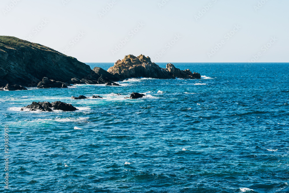 Cliff with rocks on the Spanish coast of the Atlantic Ocean