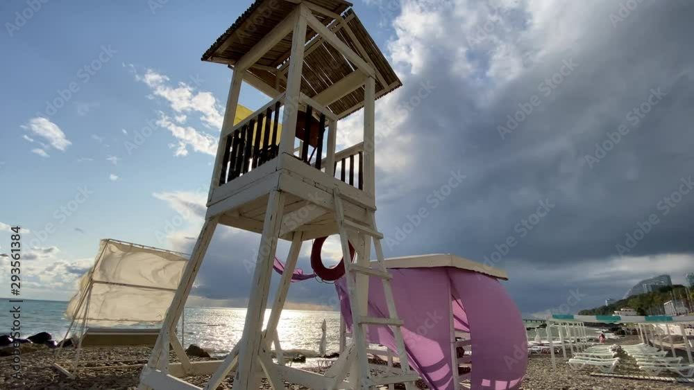 Lifeguard tower on the beach at sunset time Lifeguard tower on the beach at sunset time