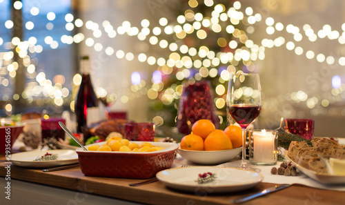 christmas dinner and eating concept - food and drinks on table at home © Syda Productions
