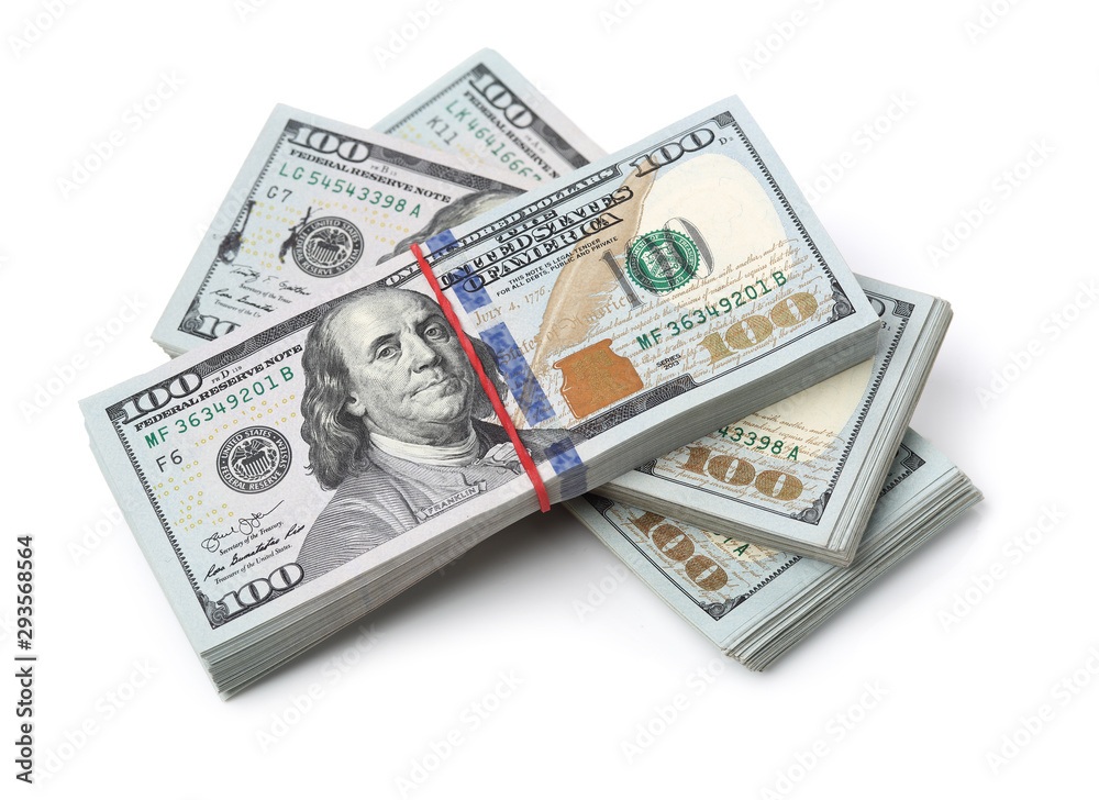 Many bundle of US 100 dollars bank notes isolated on white background Many bundle of US 100 dollars bank notes isolated on white background