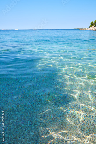 Fototapeta Naklejka Na Ścianę i Meble -  Crystal clear blue green Adriatic sea and a rocky beach on the island Krk, Croatia,