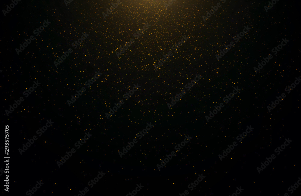 Abstract background of flickering gold particles and light flare
