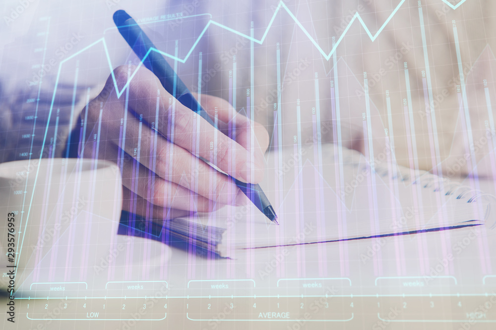 Forex chart displayed on woman's hand taking notes background. Concept of research. Double exposure Forex chart displayed on woman's hand taking notes background. Concept of research. Double exposure