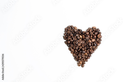 heart of coffee beans made by hand on a white background. space for text © Taranova_ksenya