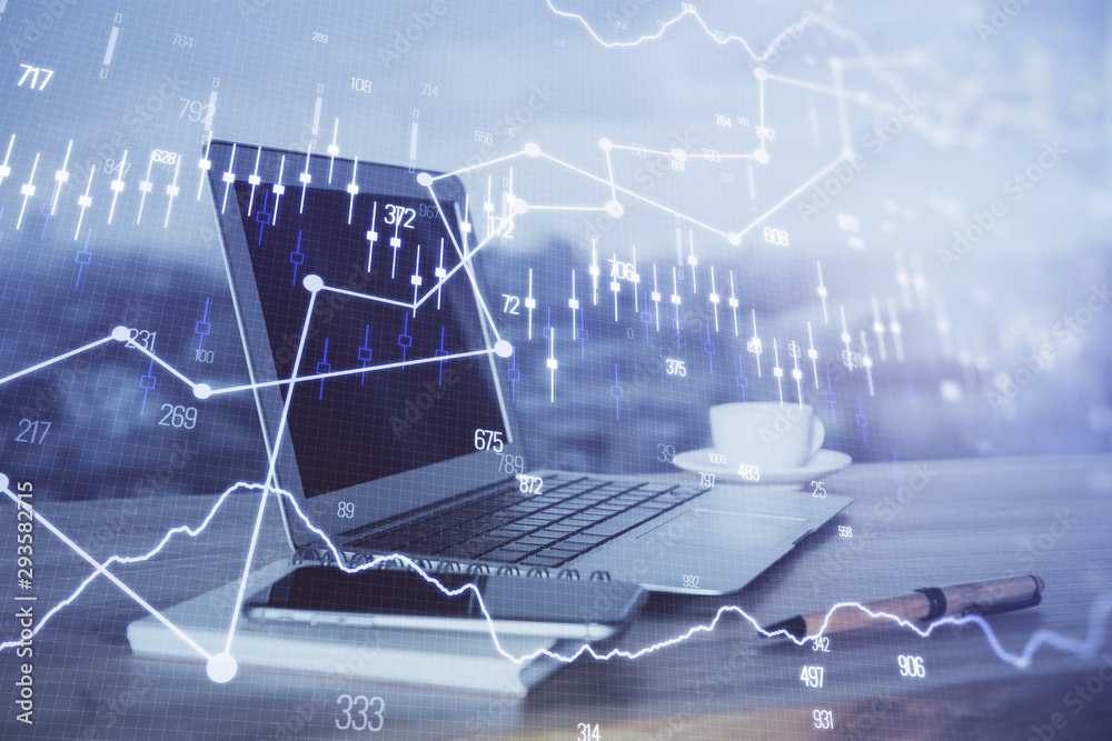 Forex market graph hologram and personal computer on background. Double exposure. Concept of investment. Forex market graph hologram and personal computer on background. Double exposure. Concept of investment.